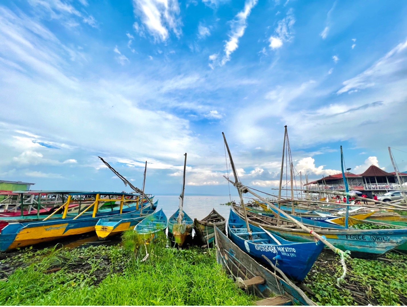 Vibrant fishing boats docked at Dunga Beach, a bustling landing site for fishers.