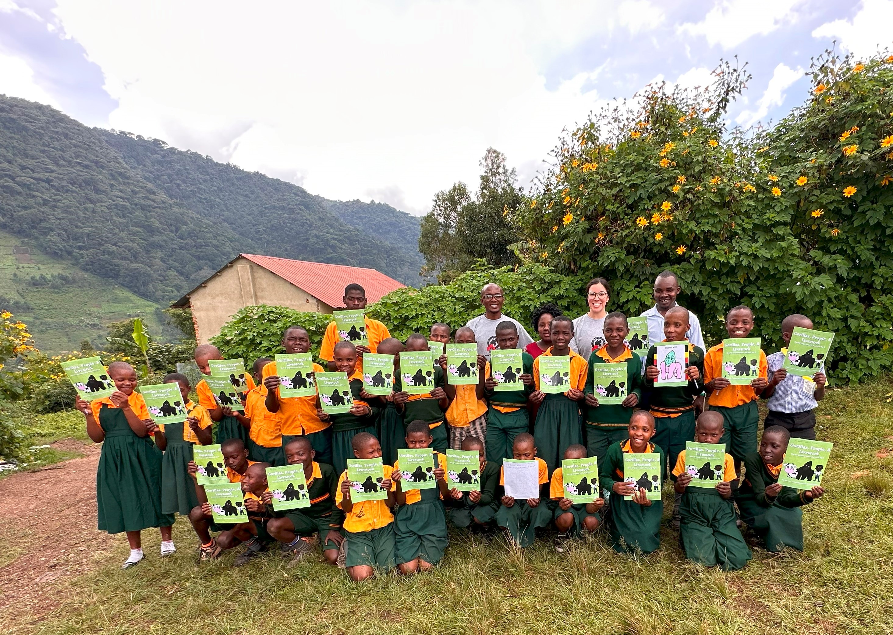 Students at St. Matthews primary school in Bwindi completing the workbook: "Gorillas, Livestock, and People”