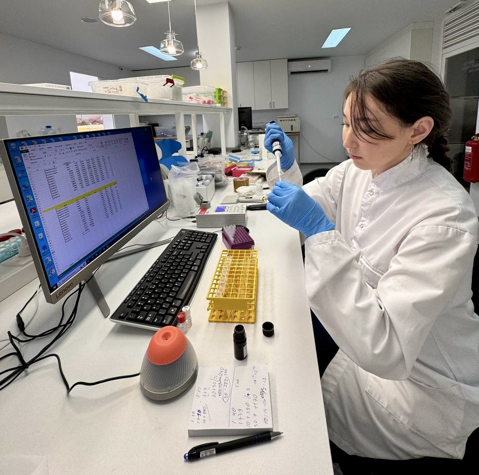 Alina prepares samples in the laboratory