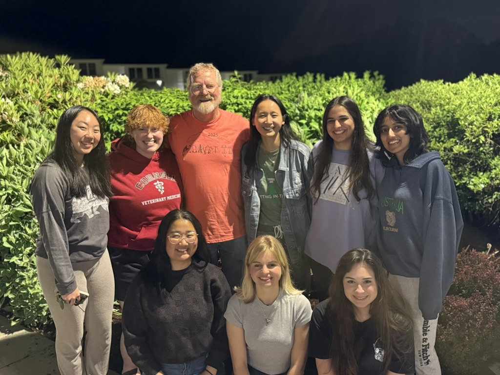 Several students standing with Dr. Rod Getchell and smiling.