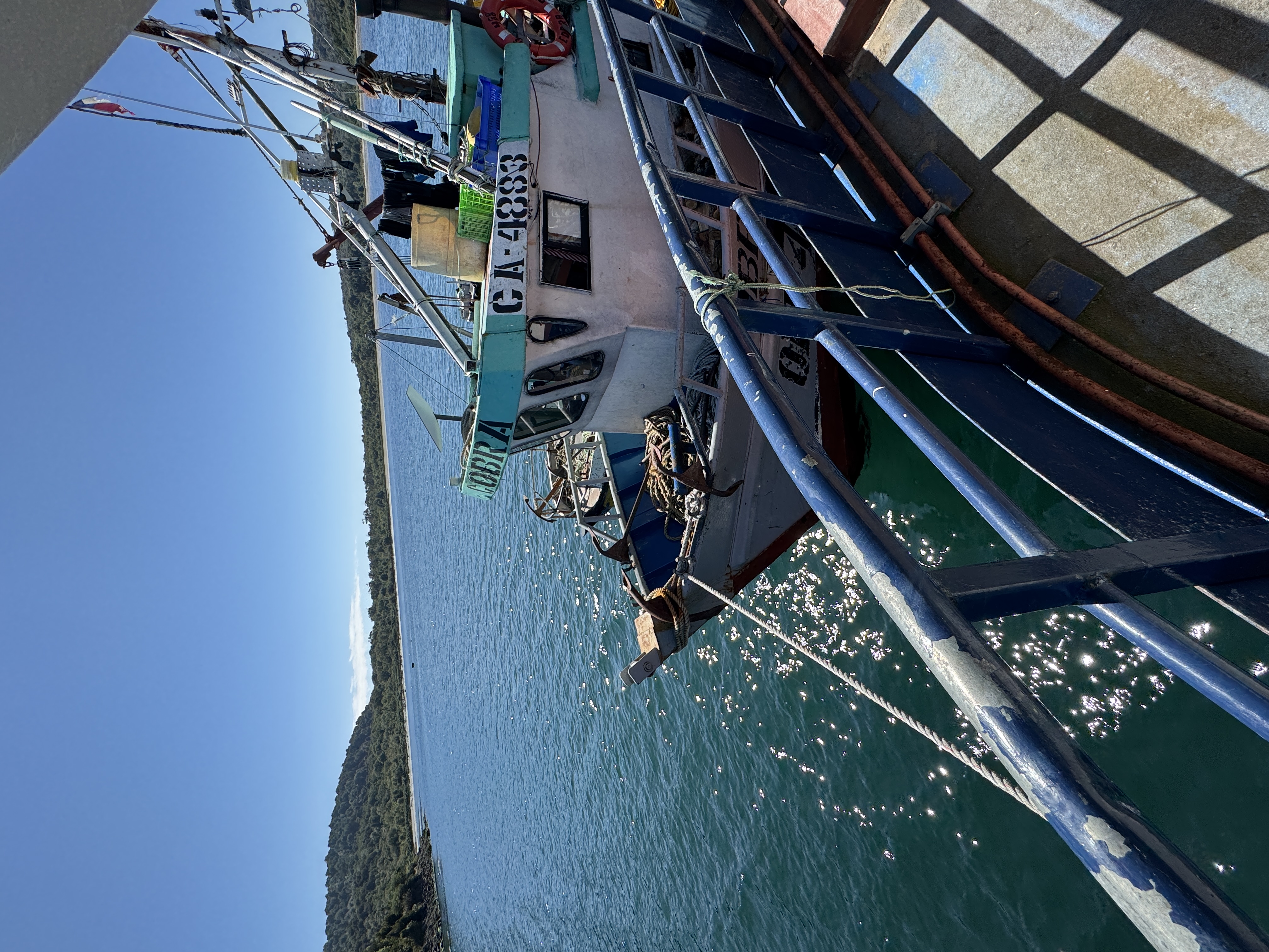Fishing boat docked in the ocean.
