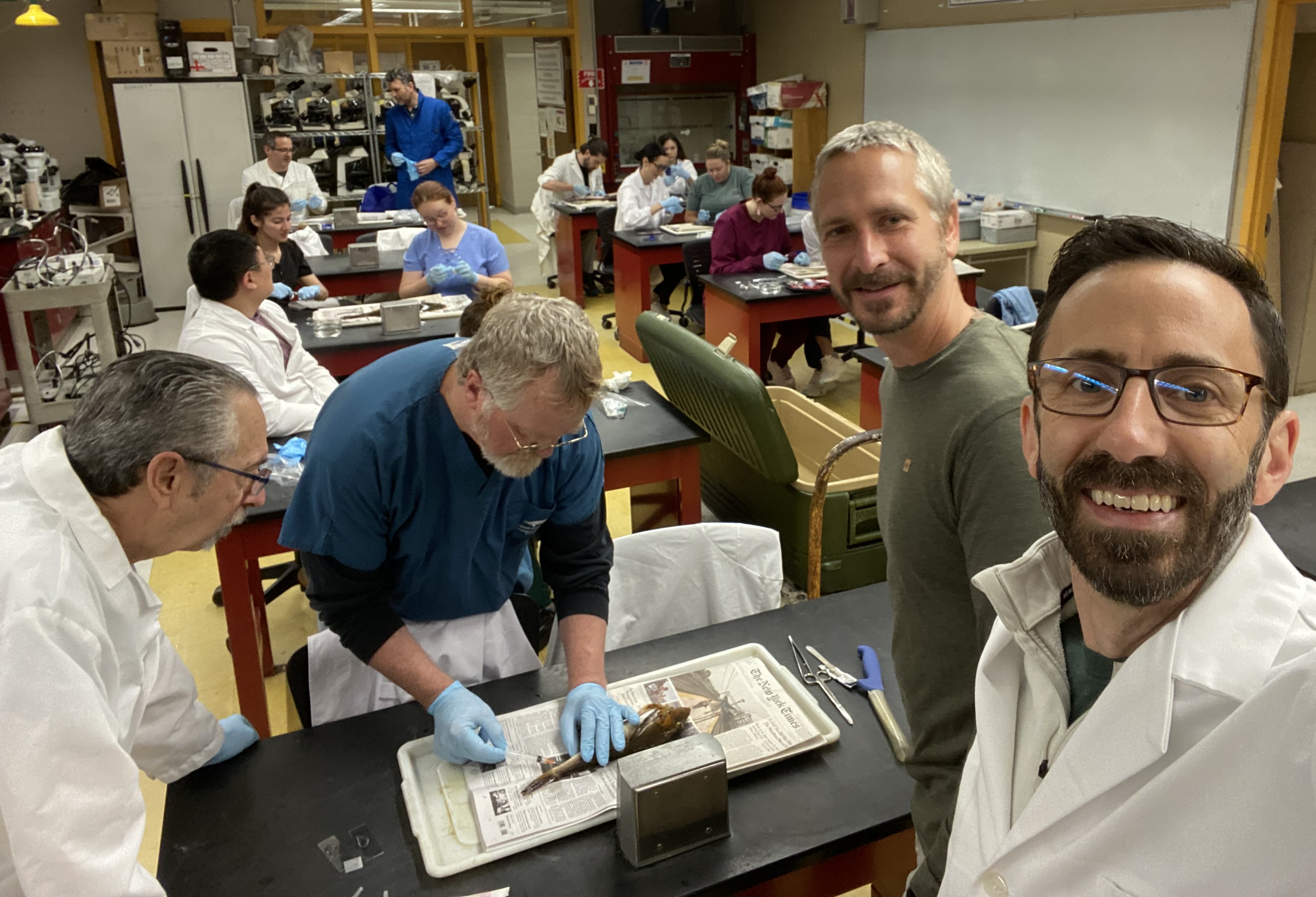 Getchell with the AQUAVET II class, along with his colleagues Jan Lovy and Tom Loch in the fish necropsy lab.