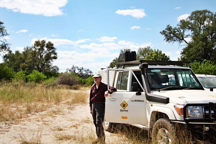 Steve Osofsky standing by jeep in Bwabwata National Park