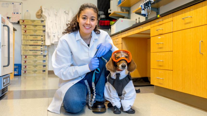 CALS undergraduate Genesis Contreras ’24 and her service dog, Nugget, at the Animal Health Diagnostic Center.