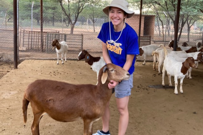 Stacy Kanek with Happy the Damara sheep.