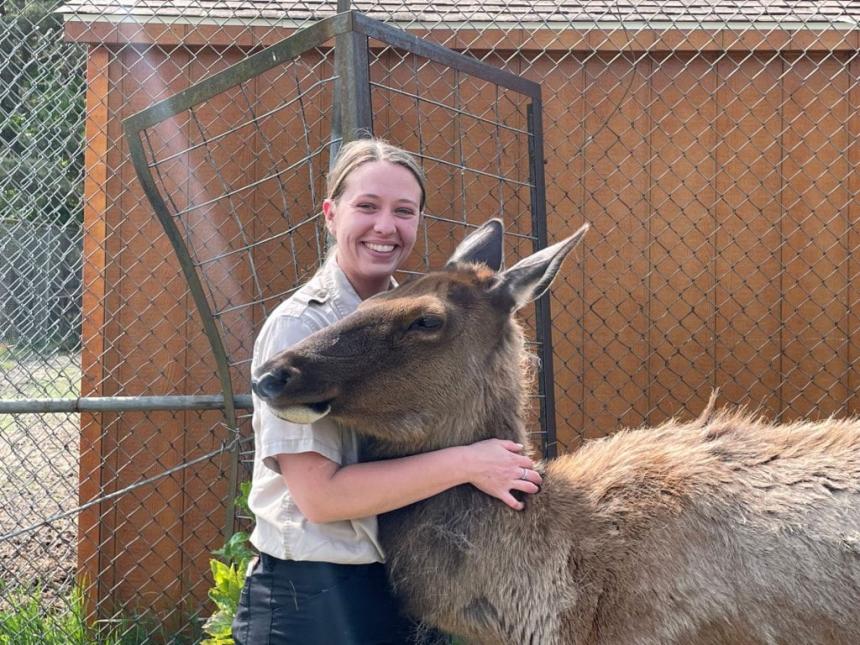 Erica Jackson shown with an elk.